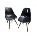 Charles & Ray Eames for Herman Miller, a pair of modern shell chairs,