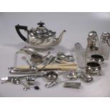 A collection of silver including a bachelor teapot,