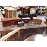 A Victorian rosewood fitted toilet box, a smokers cabinet, a mahogany writing slope and other items