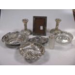 A collection of 4 silver bon bon dishes,