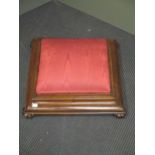 A Victorian rosewood foot stool, square form of shaped feet.