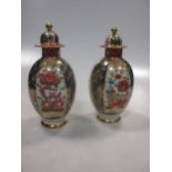 A pair of Sampson vases and covers