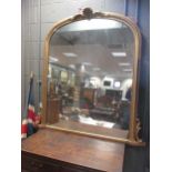 A Victorian gilt framed overmantle mirror, of arched form with shell top cresting, 139x138cm