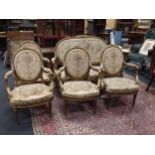 A French Louis XVI style giltwood and tapestry upholstered 5 piece salon suite, settee width
