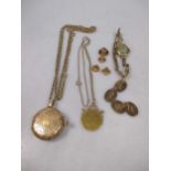 A collection of gold jewellery and watches,