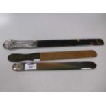 A late Victorian tortoiseshell letter opener page turner and two other letter openers (3)