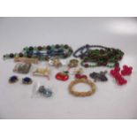 A collection of costume jewellery, many pieces 'signed'