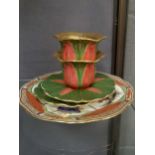 A pair of 19th century Spode green, red and gilt cups and saucers; a Worcester 'Dragon in