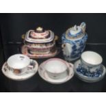 An 18 century Worcester b&w tea bowl and saucer, together with 2 Caughley tea bowls and saucer,