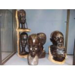 Five African ebony carved heads