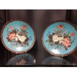 A pair of mid 20th century cloisonne plates decorated with cranes