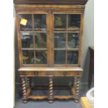 A William and Mary reproduction walnut display cabinet, on five barley-twist supports