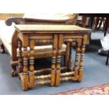 A 17th century style fruitwood small foldover table on vase and bobbin turned supports