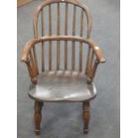 A 19th century child’s Windsor armchair, on baluster turned legs
