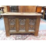 a 20th century oak coffer with carved and linen-fold decoration measurements are 58 x 92 x 48