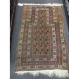 A Belouchi prayer rug woven in the tradional colours, 144x92 and another smaller prayer rug