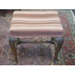 A George I reproduction walnut stool, on cabriole legs and pad feet;49x54x44cm