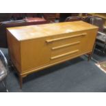 A 20th century cabinet, with three drawers, 72 x 153 x 46cm; together with a pair of occasional