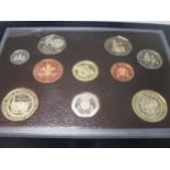 2004 UK coin collection £2-1p; together with seven similar boxed sets