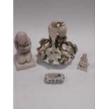 A parian porcelain figure of a kneeling child and various ceramics