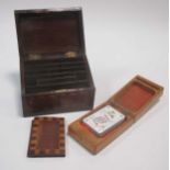 A 19th century Killarney ware inlaid notebook box; a 19th century inlaid stationery box and a a