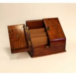 A Victorian walnut stationery box with opening front