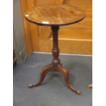 A George III mahogany circular table, 70 x 45 diam