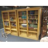 A pair of modern pale oak open bookcases, 150cm wide