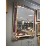 A parcel gilt frame wall rectangular mirror, 124 x 97cm
