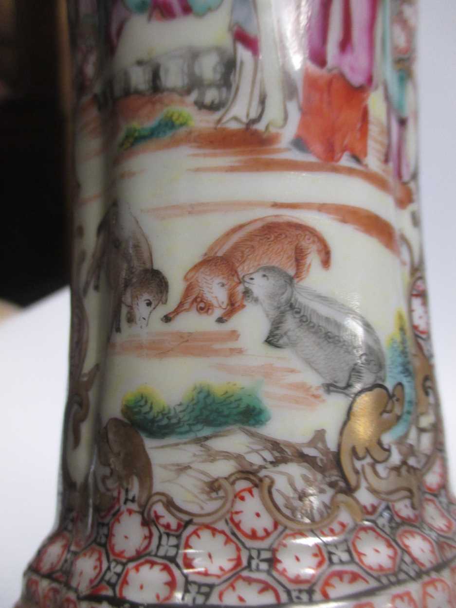 A 19th century Chinese porcelain vase and cover decorated with figures and animals in a garden - Image 4 of 5