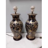 A pair of gilt decorated blue glazed table lamps, 47cm high