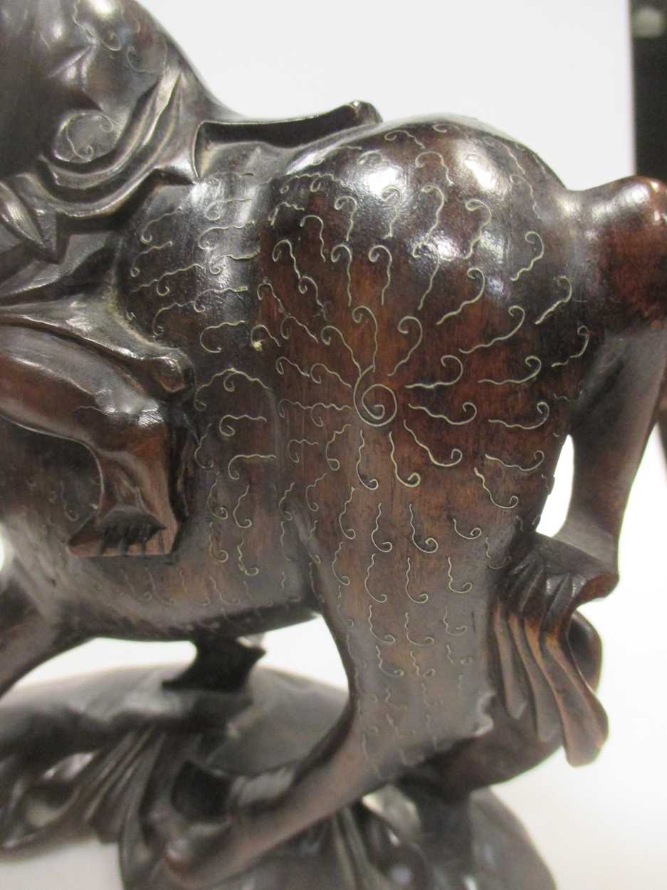 A pair of early 20th century Chinese wire inlaid wood “boy on buffalo” groups, - Image 2 of 4