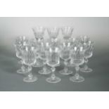Twelve Waterford heavy flared facetted wine glasses, the bases marked Waterford; together with three
