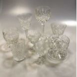 A part suite of Stuart cut glassware/objects with a part suite of hobnail cut glassware