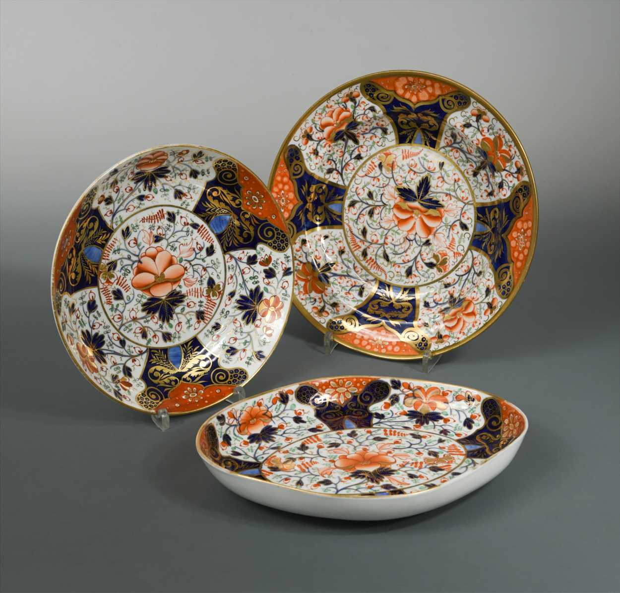 A collection of twenty two Derby and Davenport Imari porcelain,