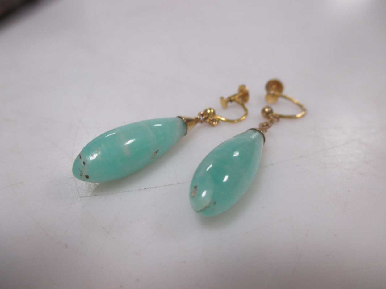 A cased pair of 9ct gold and jade pendant earrings