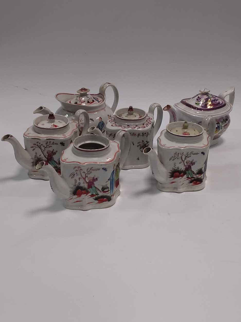 A collection of 12 English porcelain teapots to include Newhall