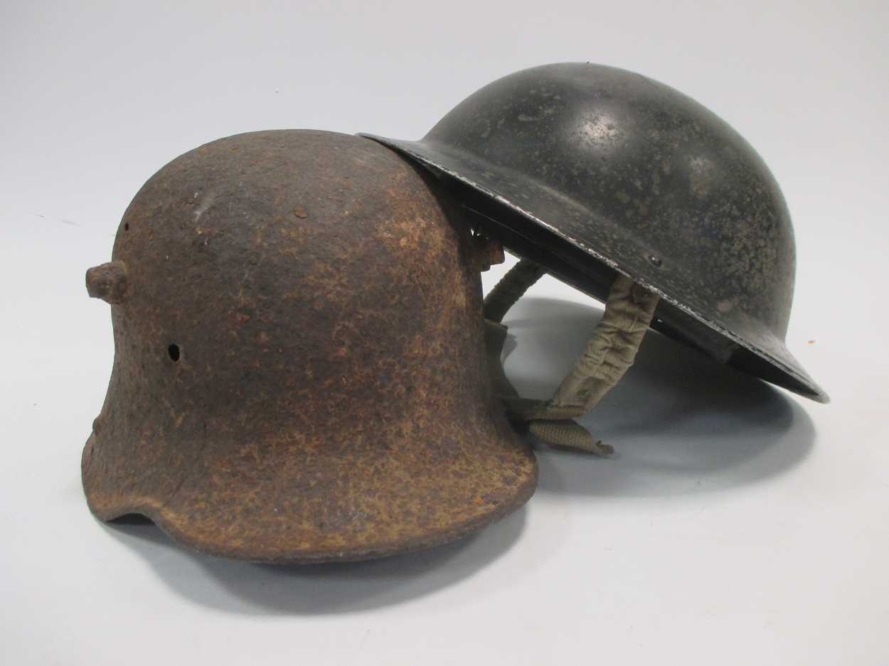 Two First World War helmets - one English, one German (Qty: 2)
