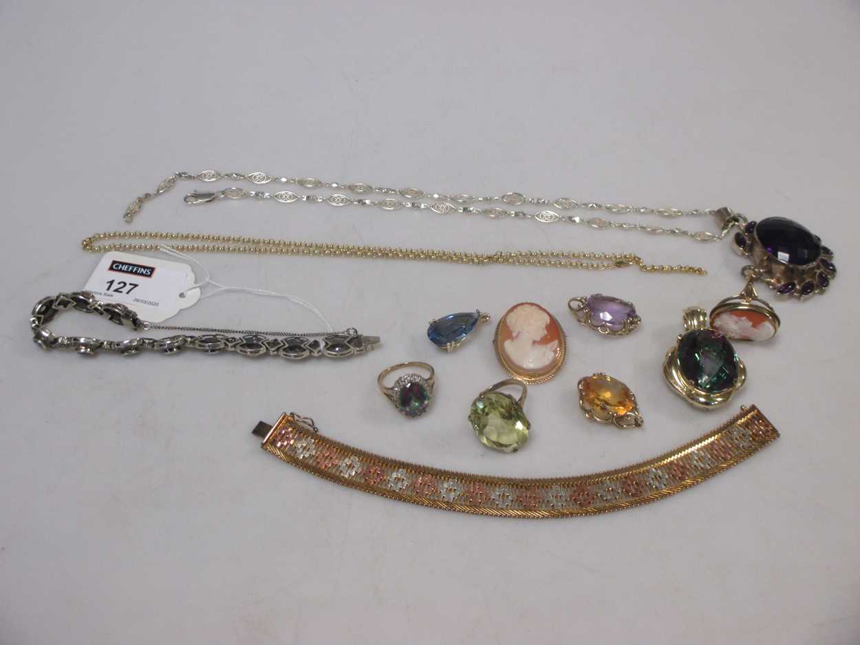 A collection of gold and silver jewellery