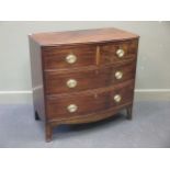 An early 19th century mahogany bowfront small chest of drawers, 88 x 91 x 49cm