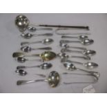 A collection of silver flatware,