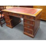 An Edwardian twin pedestal desk, 136cm wide