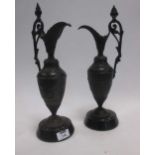 A pair of spelter urns after the antique together with three brass trays
