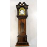 A 19th century rosewood pocket watch holder in the form of a miniature longcase clock, together with