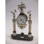 An early 18th century French alabaster and ormolu mounted clock, 47cm high