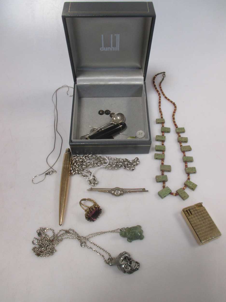 A small box of costume jewellery