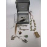 A small box of costume jewellery