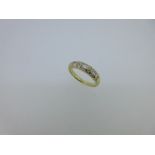 An unusual diamond half hoop ring,