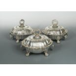 A set of three George IV silver entrée dishes with accompaniments,