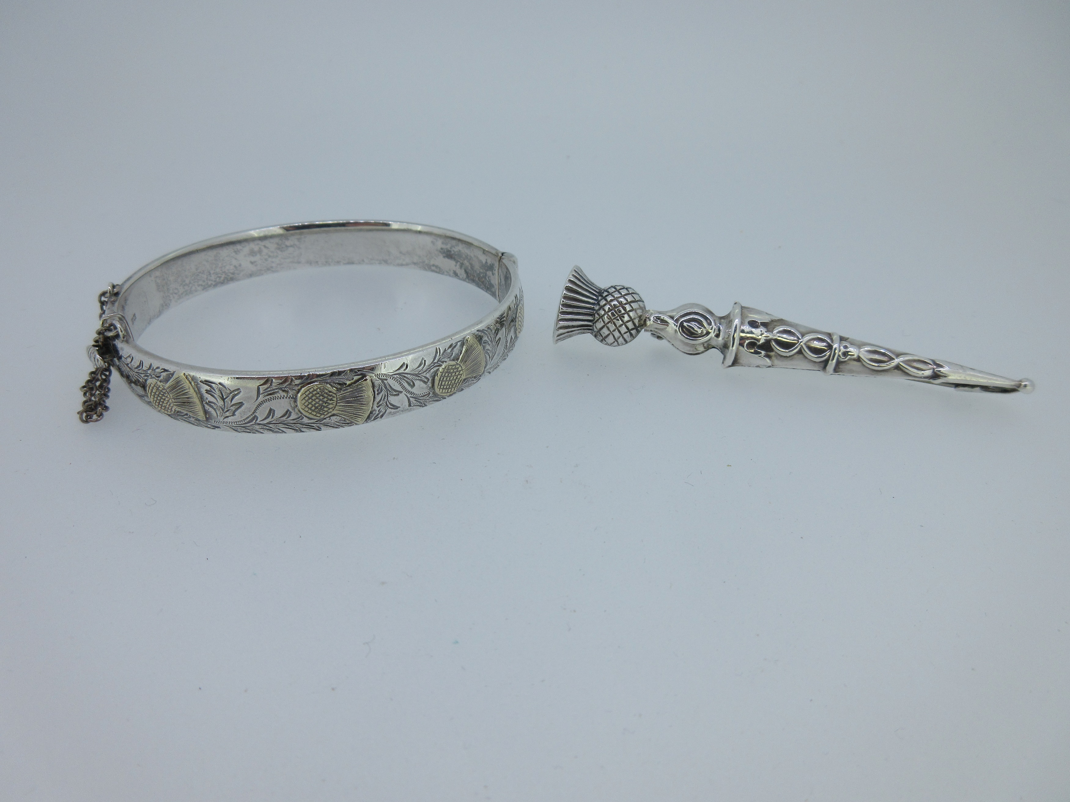 Two Scottish themed jewels of hallmarked silver,